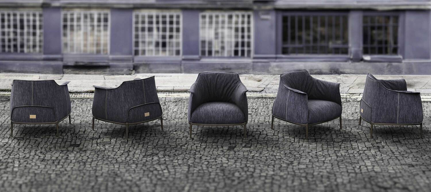 Archibald Denim Edition | Armchair Archibald Denim Edition armchair by Poltrona Frau, upholstered in denim and Pelle Frau®, a blend of Italian tradition and innovation.