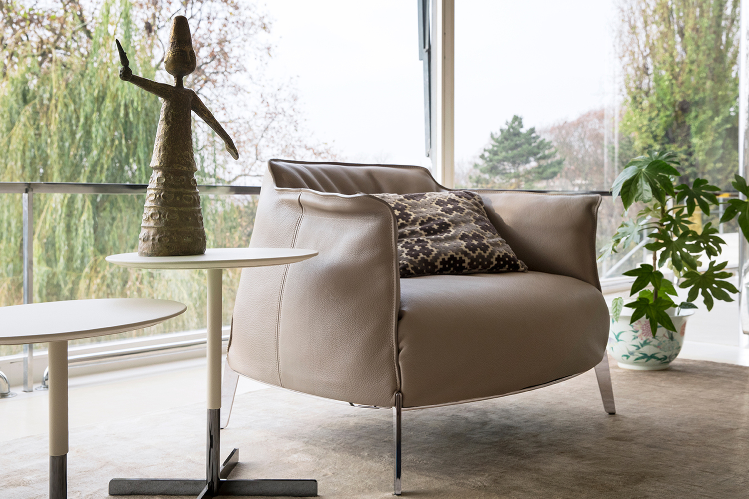 Archibald Gran Comfort | Armchair Archibald Gran Comfort armchair by Poltrona Frau, upholstered in Pelle Frau® with Italian handcrafted details.