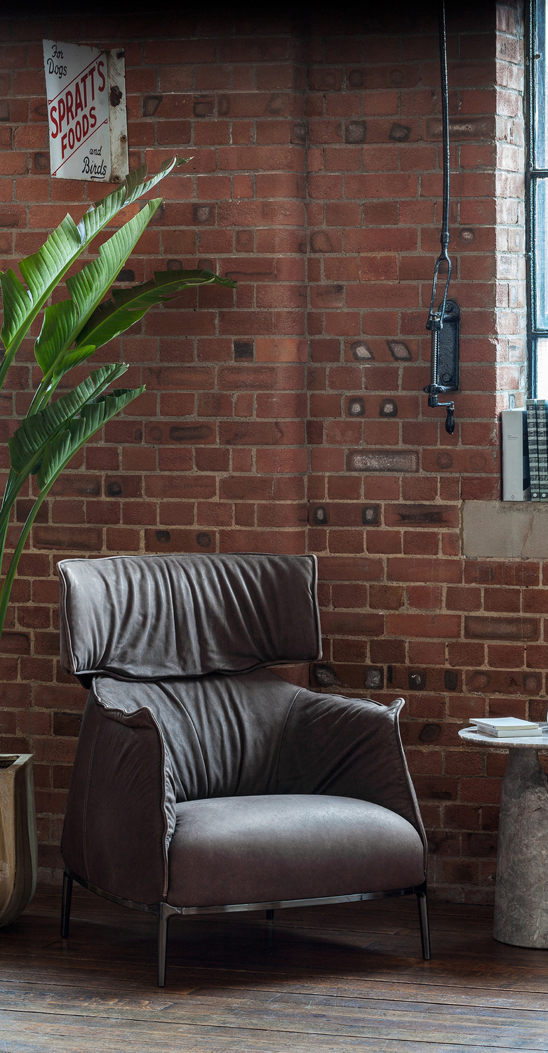 Archibald King | Armchair Archibald King armchair by Poltrona Frau, premium Pelle Frau® leather or removable fabric, contrast stitching, steel structure and aluminum feet, epitome of Italian luxury craftsmanship