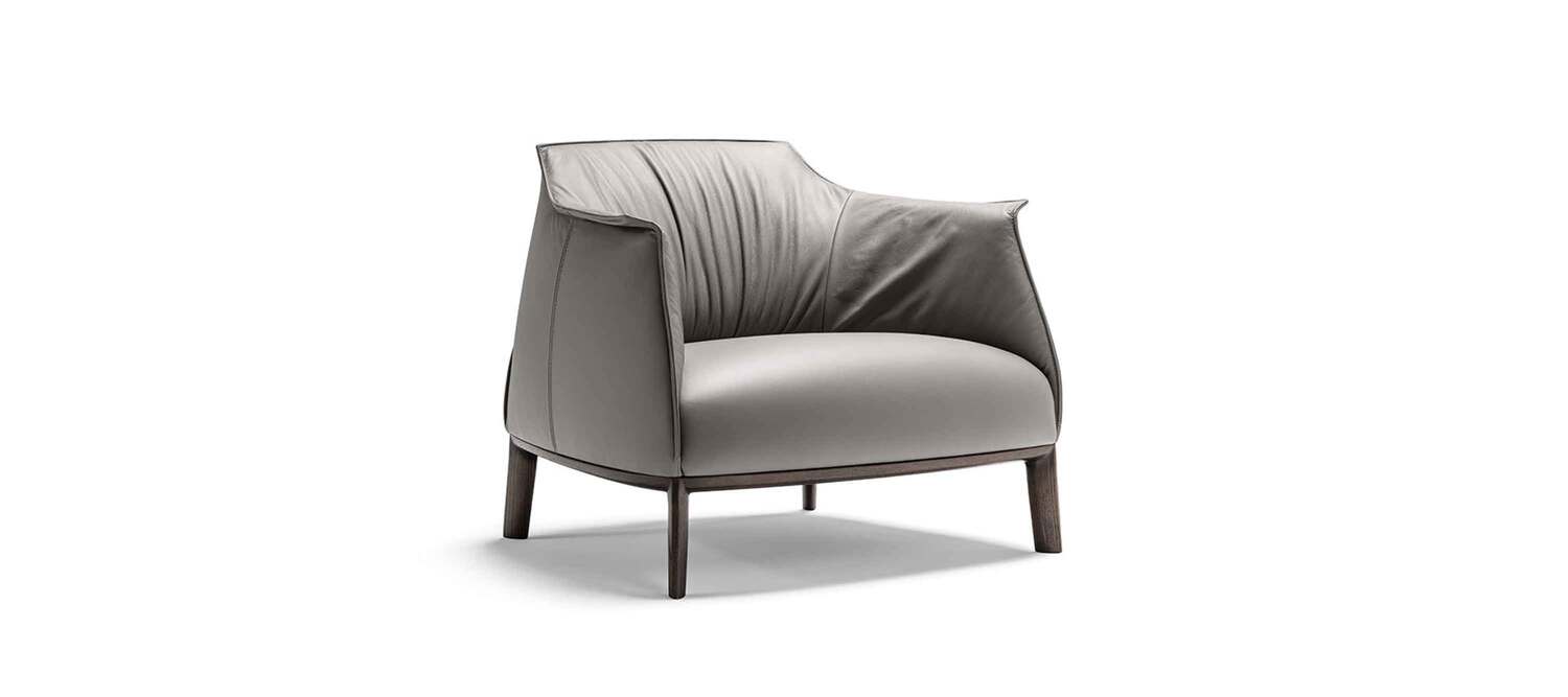 Archibald Large armchair by Poltrona Frau, Pelle Frau® leather or fabric, solid ash wood base, contrast stitching, finest Italian luxury craftsmanship