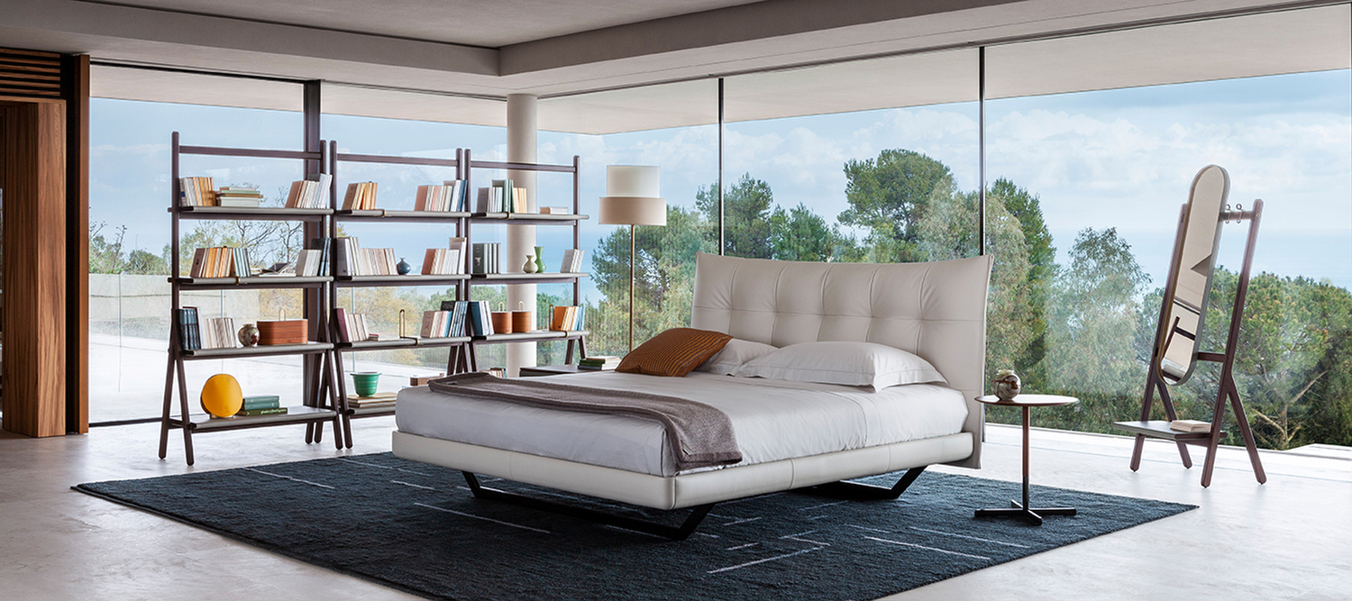 Aurora Tre bed by Poltrona Frau, with padded headboard in Pelle Frau® and birch plywood frame, contemporary Italian design.