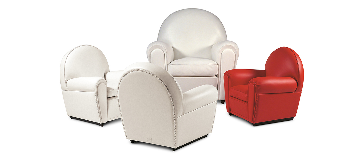 Baby Vanity | Fauteuil  Fauteuil Baby Vanity Fair de Poltrona Frau, version baby du design iconique de Renzo Frau, revêtement en cuir Pelle Frau® ou tissu, structure en hêtre vieilli, excellence artisanale italienne
