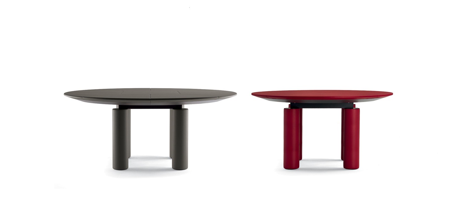 Ceo Cube | Round meeting table Ceo Cube round meeting table by Poltrona Frau, design by Lella and Massimo Vignelli, lightly padded Pelle Frau® leather top, cylindrical leather-clad legs, advanced cable management