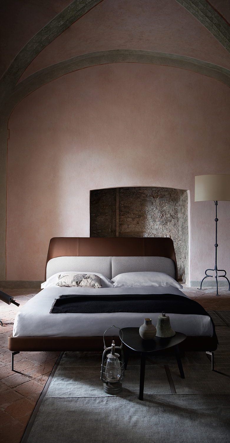 Coupè | Bed Coupé bed by Poltrona Frau, Pelle Frau® leather, hand-finished stitching, minimalist design, gunmetal steel feet, soft padded headboard