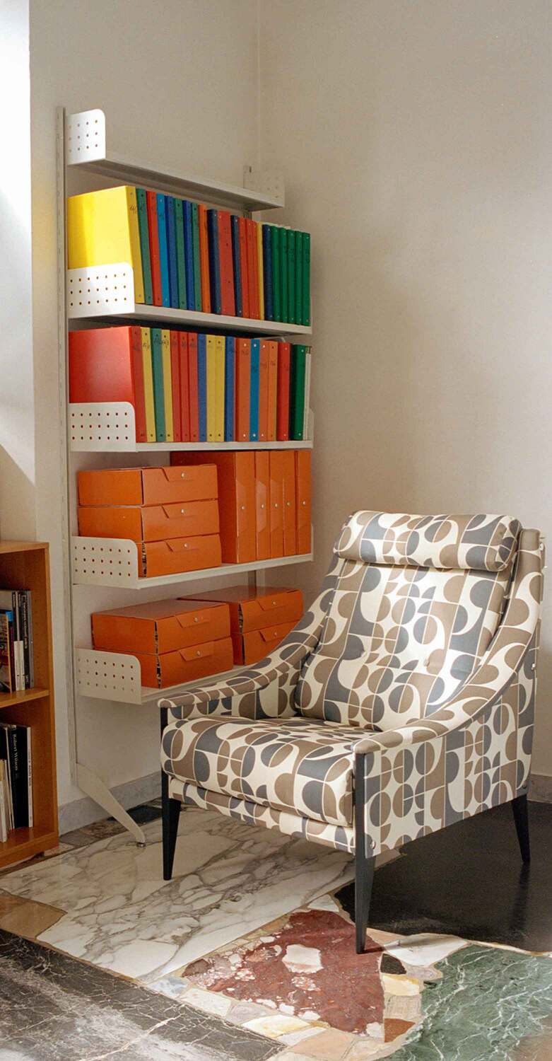 Dezza 48 armchair by Poltrona Frau, Gio Ponti design, Pelle Frau® leather, integrated goose down headrest, modular structure, black or white lacquered ash or Canaletto walnut legs