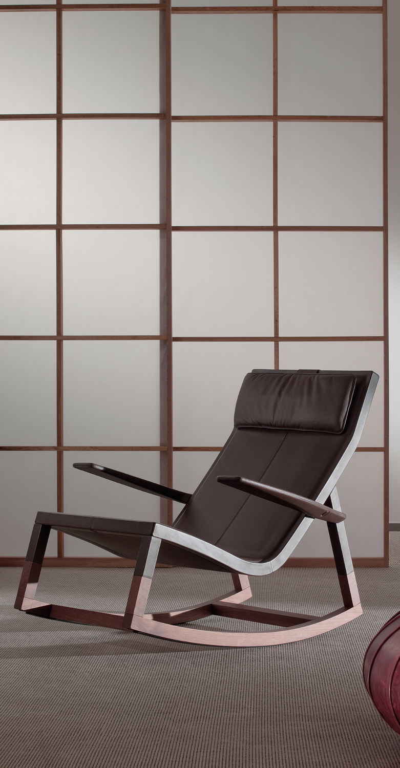 Don'do | Sillón mecedora Mecedora Don’do de Poltrona Frau, diseño de Jean-Marie Massaud, cuero Pelle Frau®, base de roble macizo curvado al vapor con acabado nogal envejecido, costuras longitudinales artesanales, reposacabezas ajustable, artesanía italiana de lujo