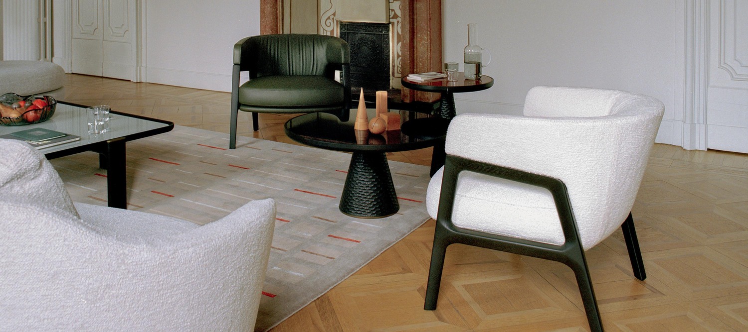 DUO | Lounge armchair DUO Lounge armchair by Poltrona Frau, with soft lines and Pelle Frau® upholstery, a symbol of Italian design.