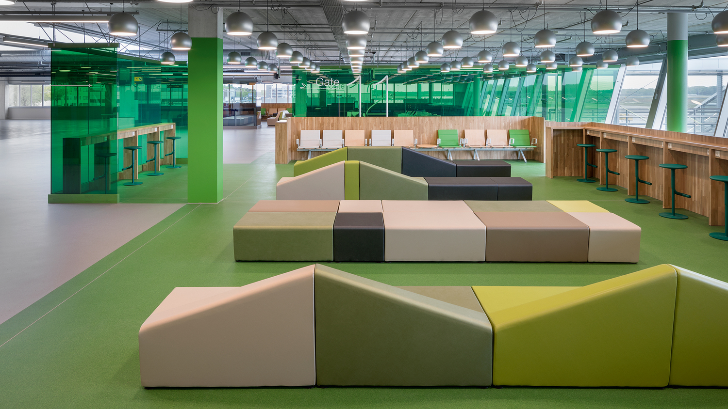 Interiors of Eindhoven Airport, with modular Poltrona Frau seating, functional and comfortable design for waiting areas