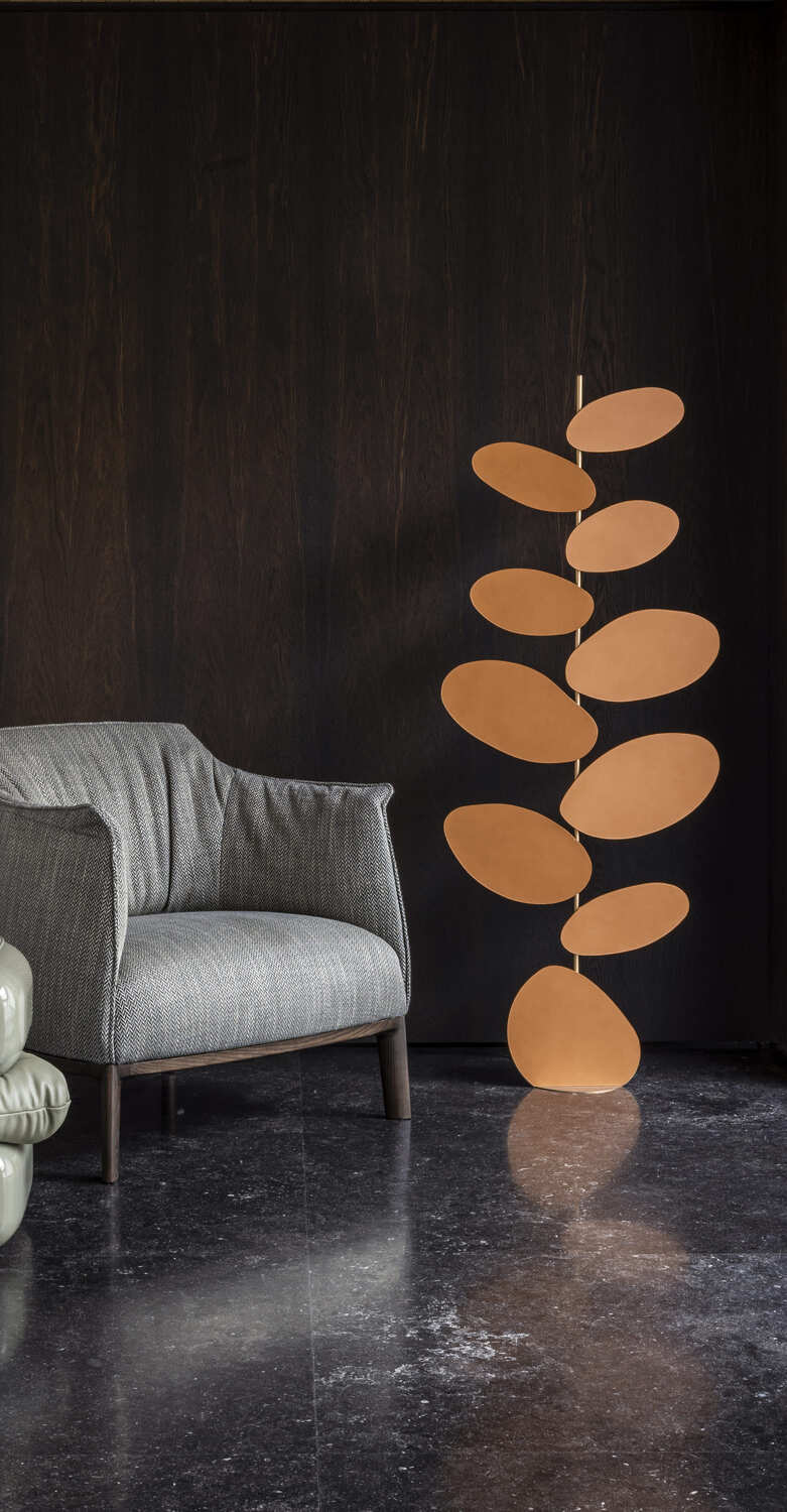 Foliage floor lamp with nature-inspired design.