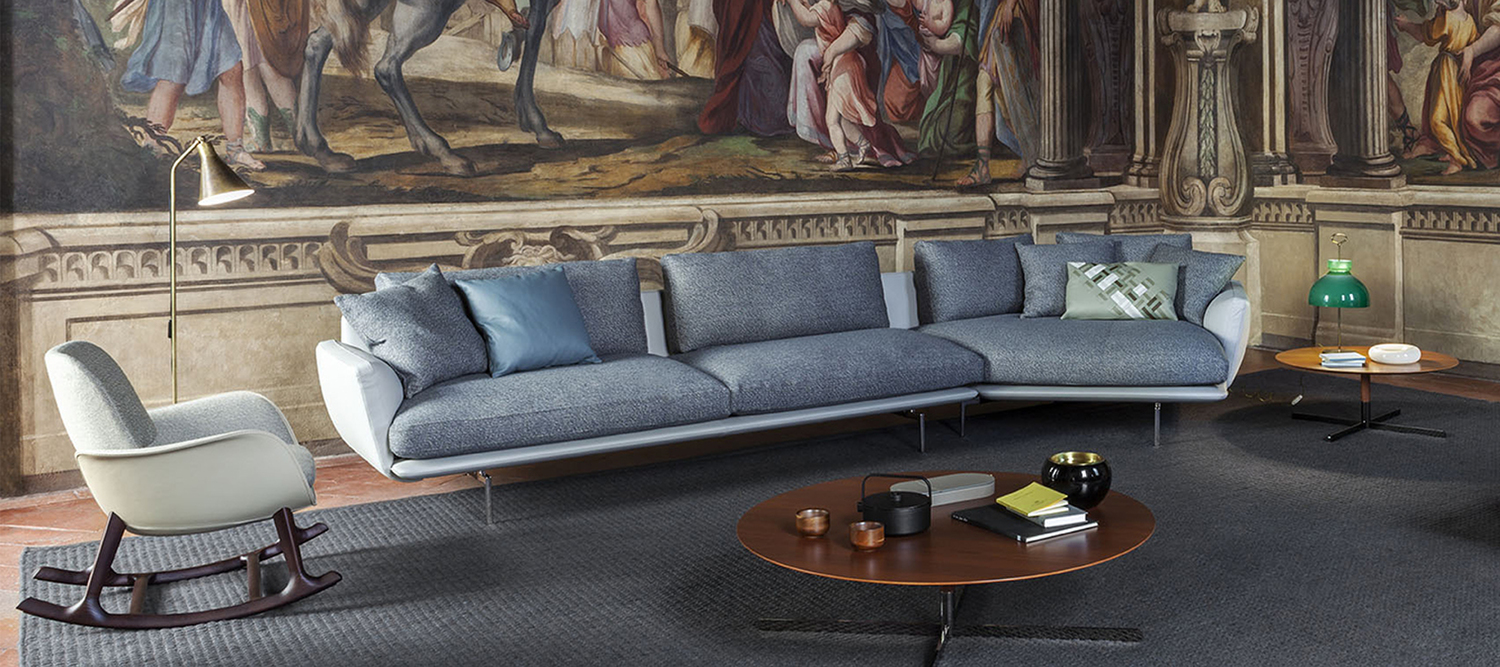 Get Back | Sofa Get Back sofa by Poltrona Frau with seat and backrest merged into a single element, Pelle Frau® leather armrests, feather cushions and aluminum feet, refined Italian craftsmanship