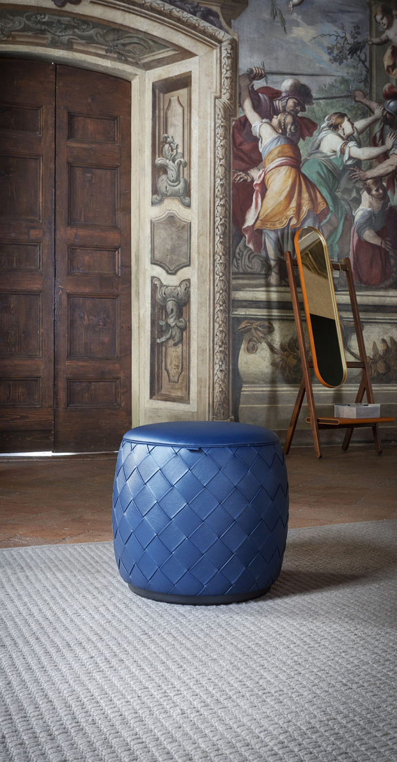 Grant | Ottoman Ø46cm Grant ø46 ottoman by Poltrona Frau, artisanal Pelle Frau® Motif Knits weave and Velvety leather seat, birch plywood frame