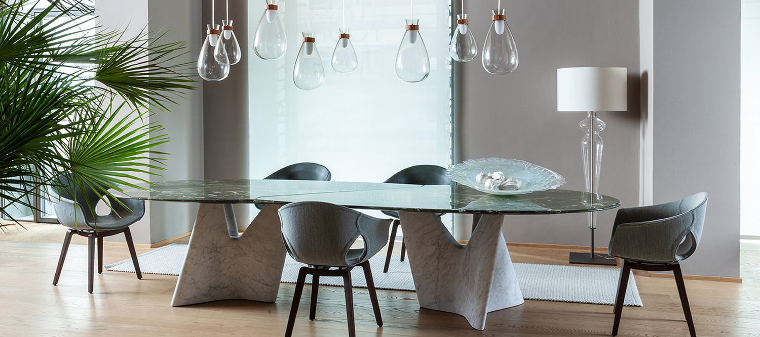 Infinito | Table Infinito table by Poltrona Frau, limited edition, staggered double oval marble top, sculptural Carrara marble bases, signed and numbered design