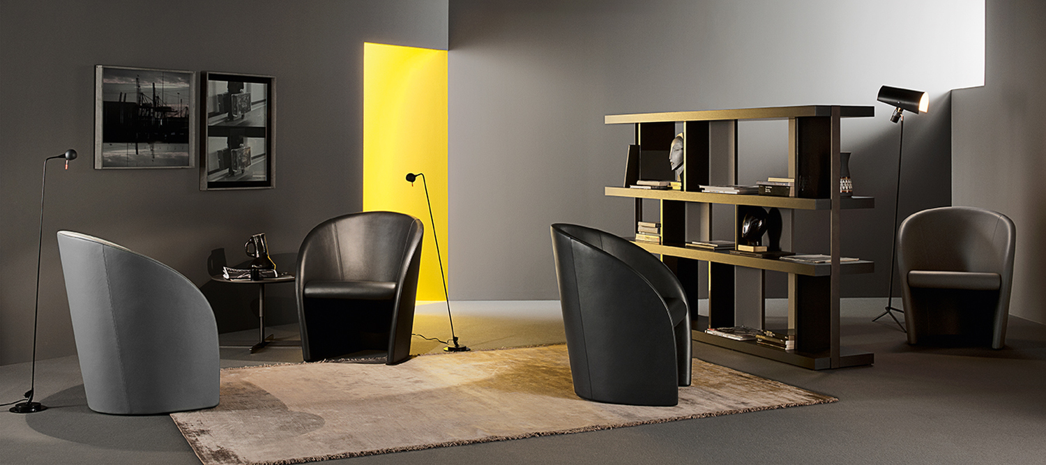 Intervista | Armchair Intervista armchair by Poltrona Frau in Pelle Frau® leather, steel and polyurethane frame, Italian design by Vignelli, enveloping comfort