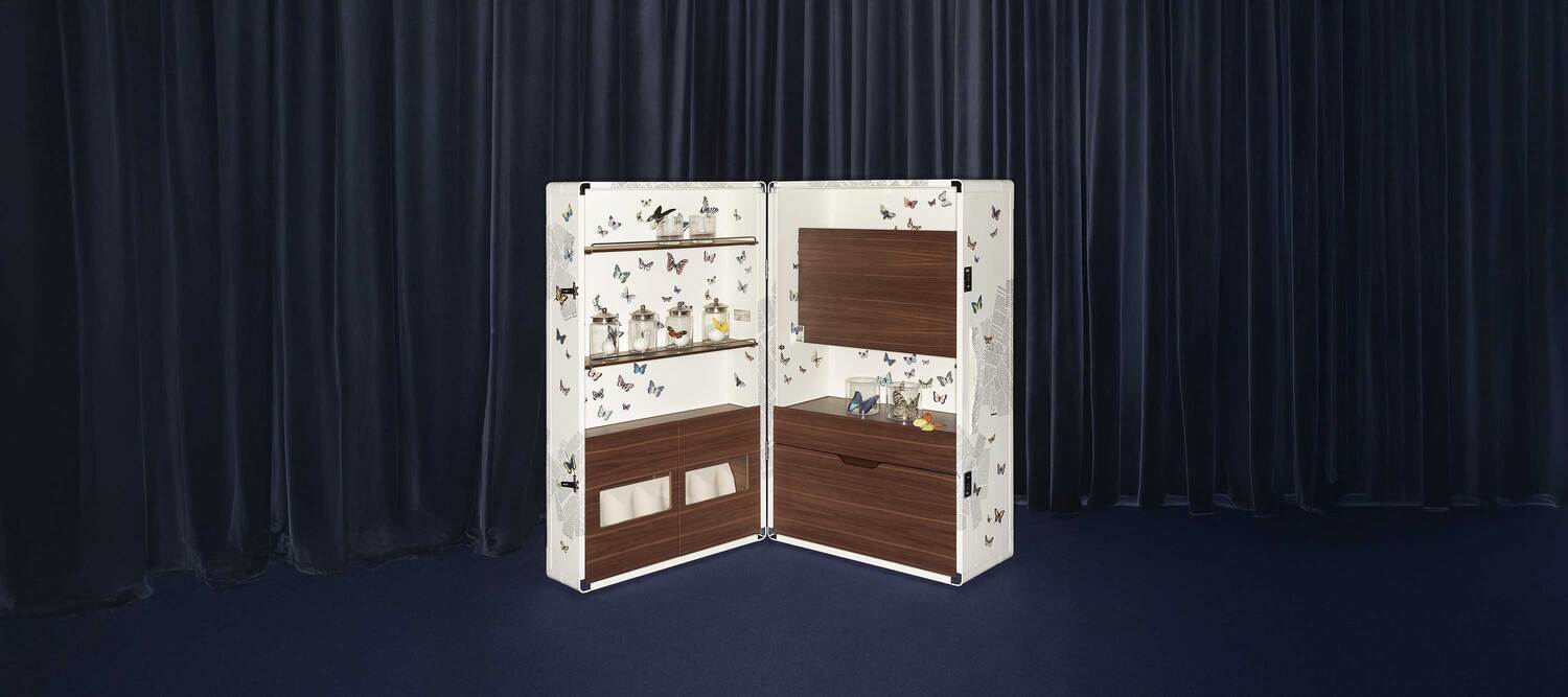 Isidoro "Ultime Notizie" bar cabinet by Poltrona Frau, with exclusive design and refined details.