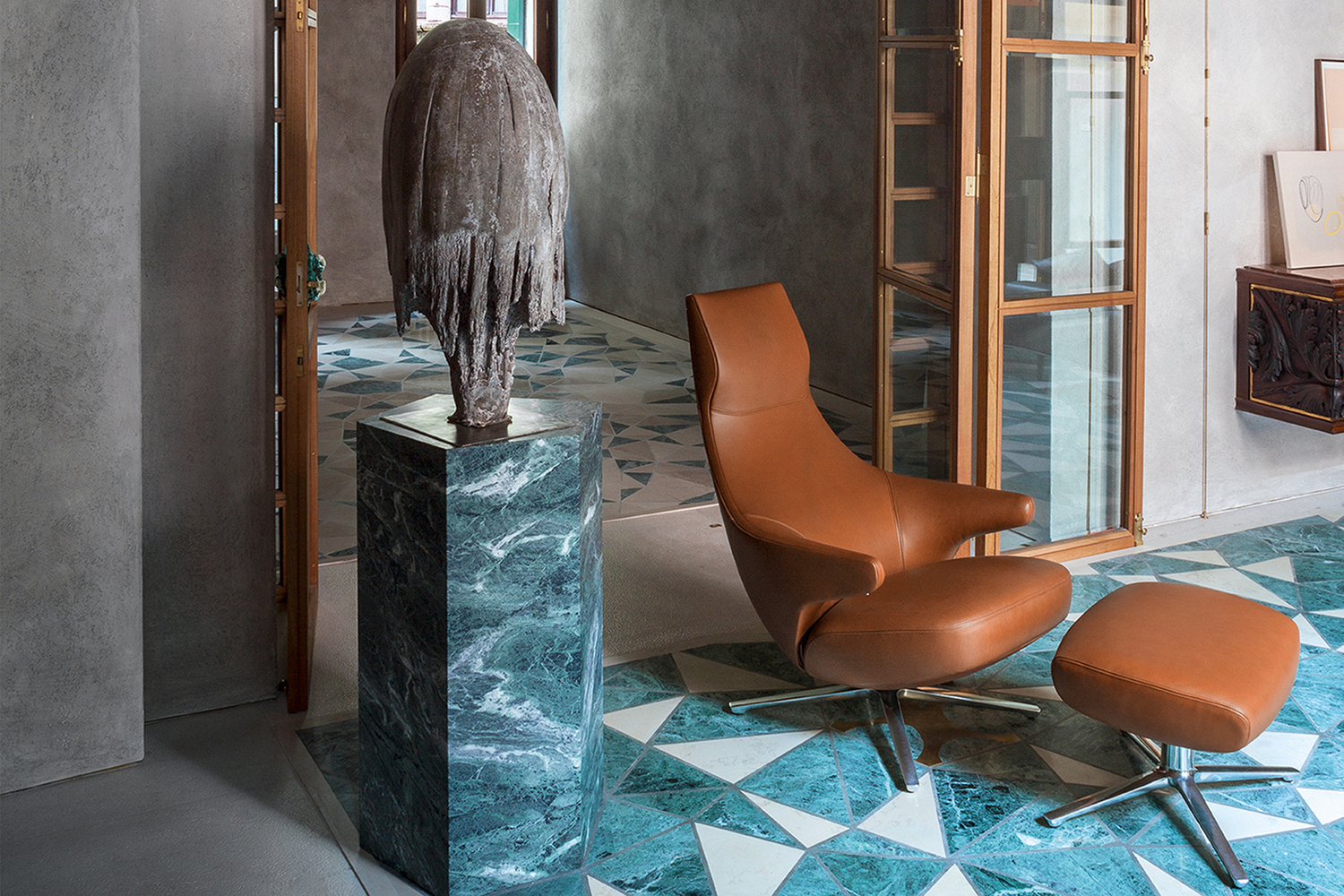 Jay Lounge | Armchair Jay lounge armchair by Poltrona Frau, with ergonomic design and leather upholstery.