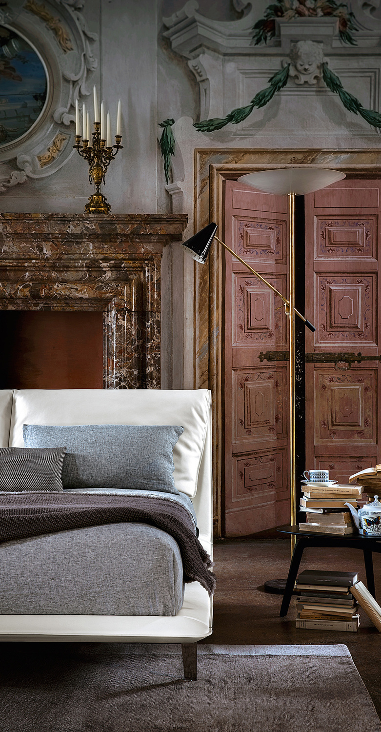 John-John | Bed John John bed by Poltrona Frau, with padded headboard and leather upholstery.