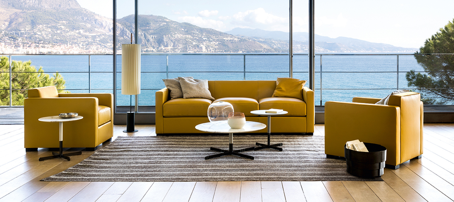 Linea A | Sillón Butaca Linea A de Poltrona Frau en Pelle Frau® negra, costuras a medida, estructura de haya, tradición artesanal italiana de excelencia