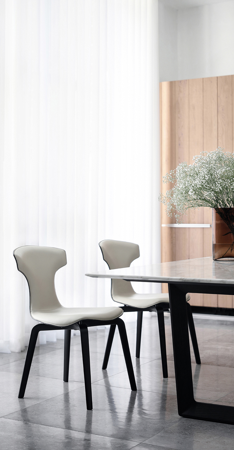Montera | Chair Montera Chair by Poltrona Frau with rigid polyurethane shell, inner Pelle Frau® leather and outer Saddle Extra leather, wenge-stained ash legs