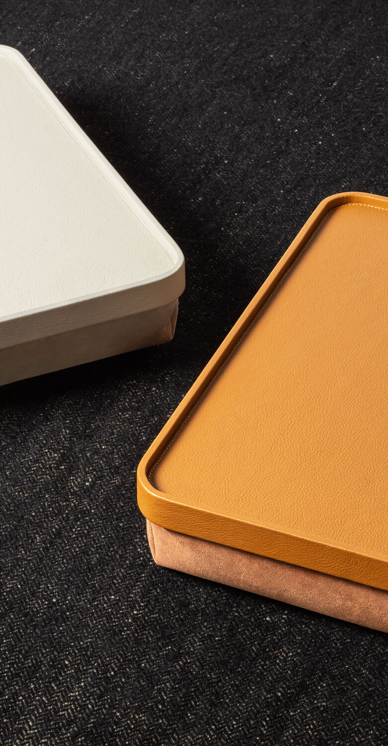 Office collection | Laptop tray Giobagnara x Poltrona Frau laptop tray in Pelle Frau® leather, base with polyester balls, available in various colors, Italian luxury craftsmanship