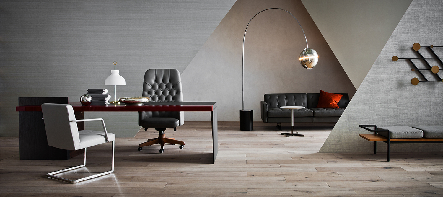 Oxford | Fauteuil de bureau Fauteuil de bureau Oxford Poltrona Frau avec structure en hêtre massif, revêtement en Pelle Frau® avec capitonné artisanal, piètement à cinq branches en bois ou aluminium, design italien de luxe