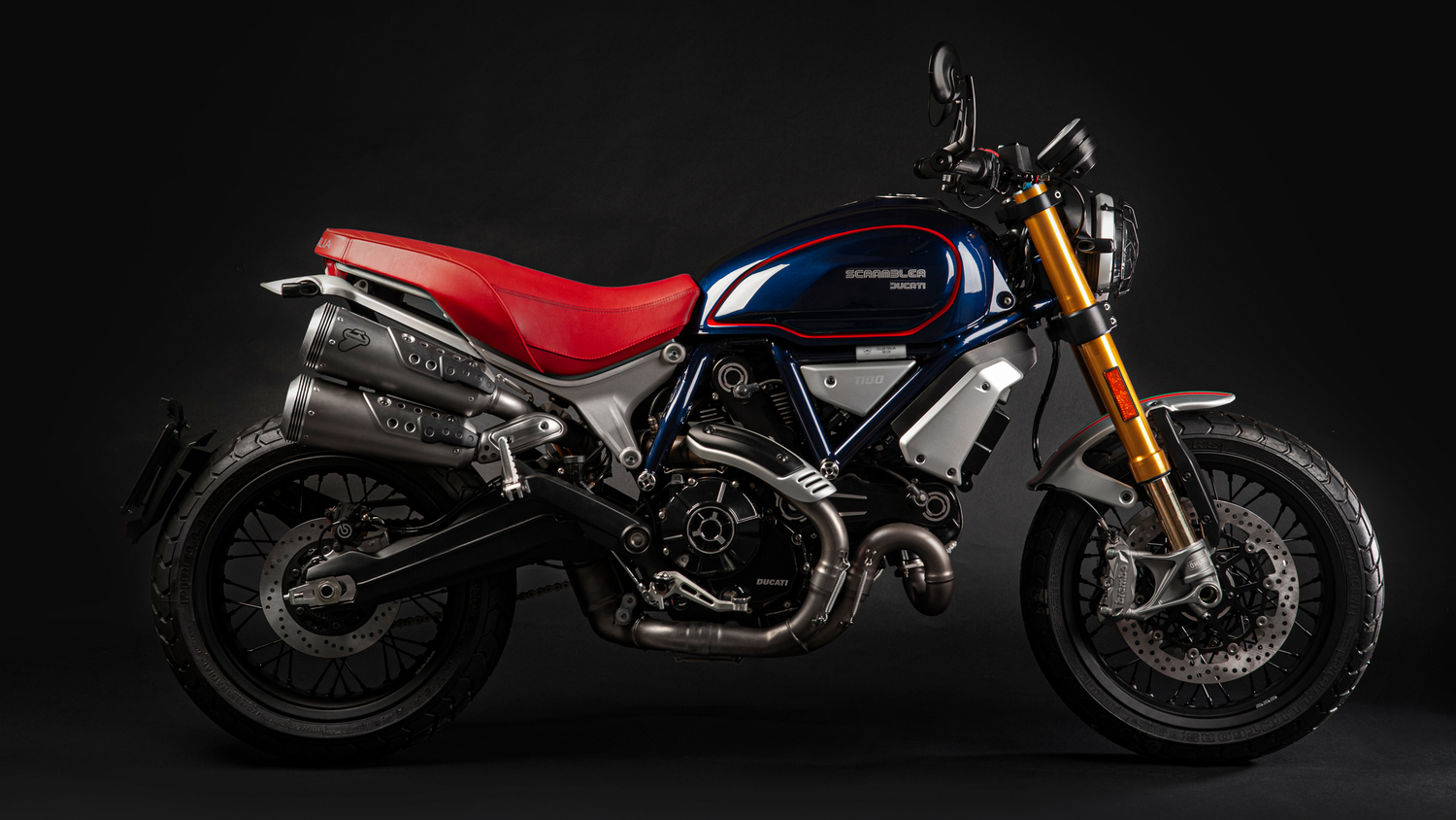 Scrambler 1100 Ducati Club Italia®  Scrambler 1100 Ducati Club Italia® : selle en cuir Pelle Frau® rouge carmin avec logo “Club Italia”, symbole de style, de savoir-faire italien et de passion sur deux roues.