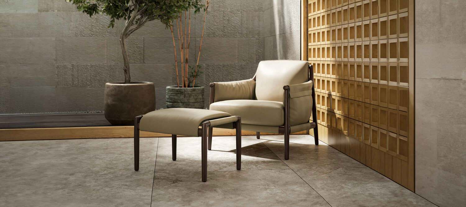 Times Lounge | Armchair Times Lounge armchair by Poltrona Frau in moka-stained ash and Pelle Frau® leather, contemporary Italian luxury craftsmanship