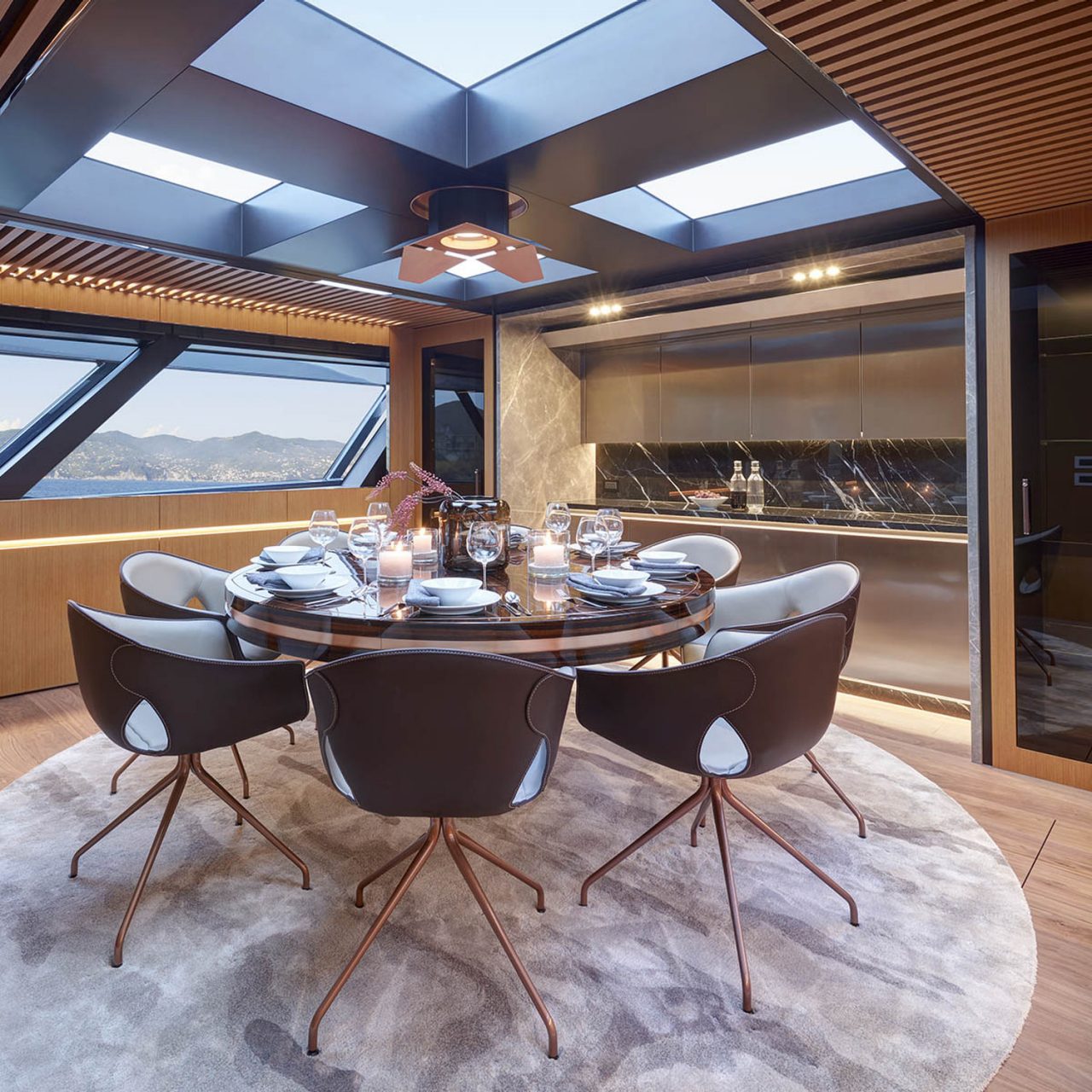 Dining area with Ginger armchair in Blue Jeans Superyacht